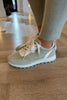 PALE GREEN AND WHITE FAUX SUEDE TRAINERS