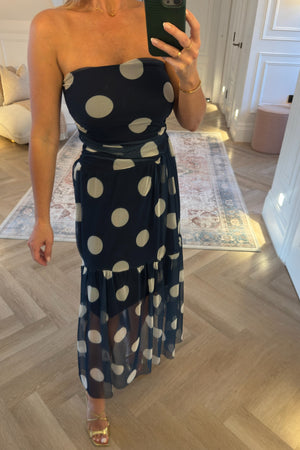 STRAPLESS NAVY DRESS WITH POLKA DOTS
