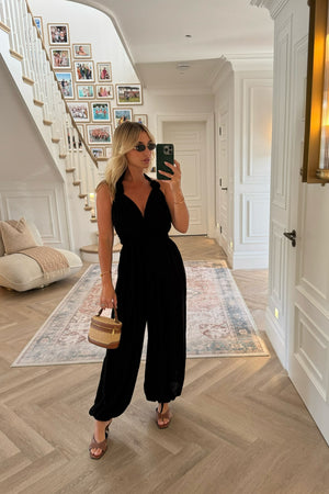 BLACK BACKLESS JUMPSUIT