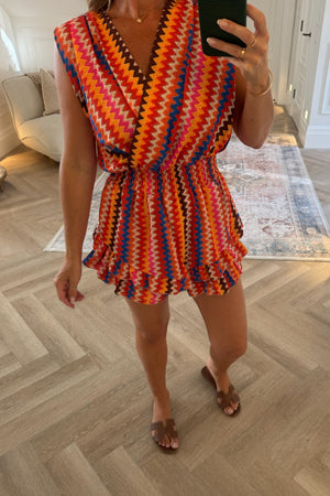 ORANGE AND BLUE ZIG ZAG PLAYSUIT