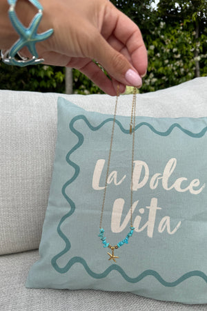 GOLD CHAIN NECKLACE WITH BLUE STONES AND STARFISH CHARM
