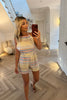 YELLOW AND PASTEL HALTERNECK PLAYSUIT